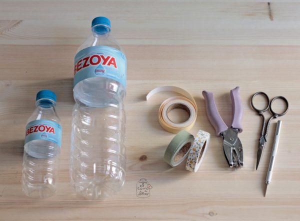 Portavelas con botellas