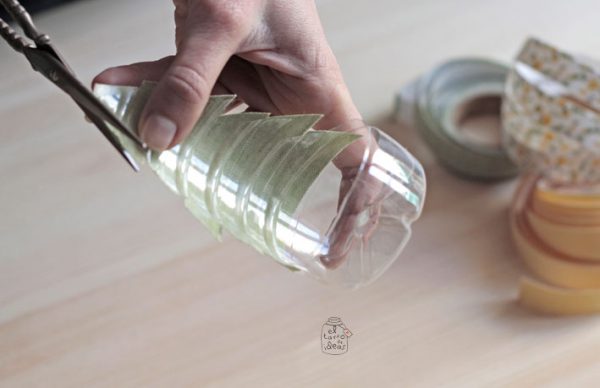 Portavelas con botellas