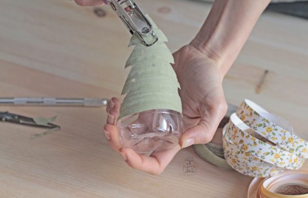Portavelas con botellas